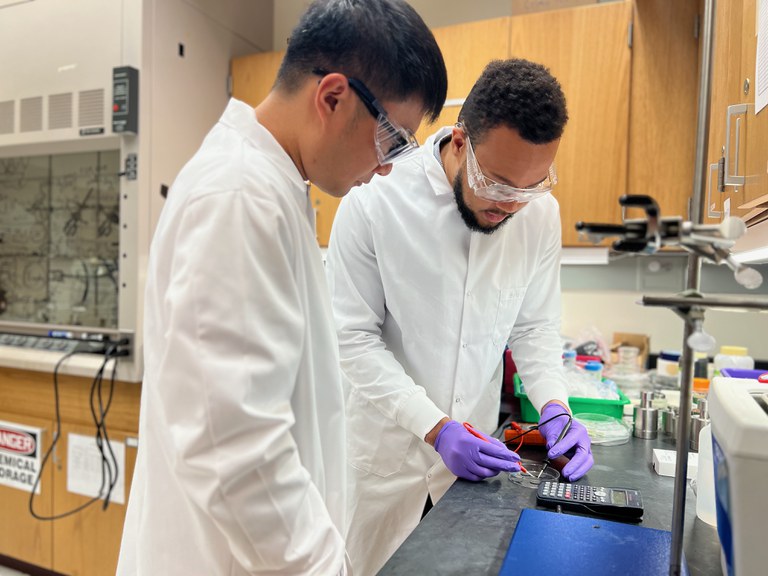 REM Student in Lab with Mentor.jpeg